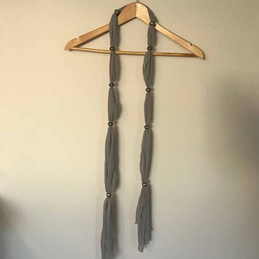 Chic grey scarf with silver details